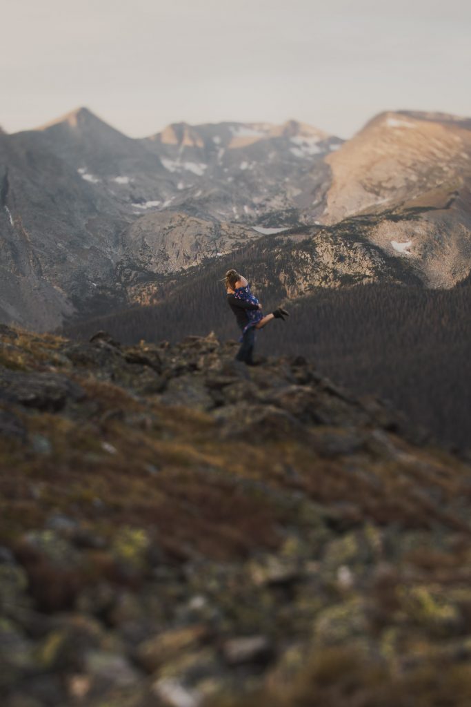 Colorado adventure Engagement photographer at sunrise in Rocky Mountains