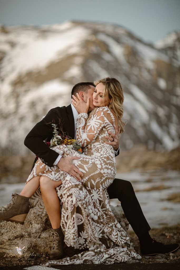 Intimate portrait surrounded by alpine wildflowers and mountain views