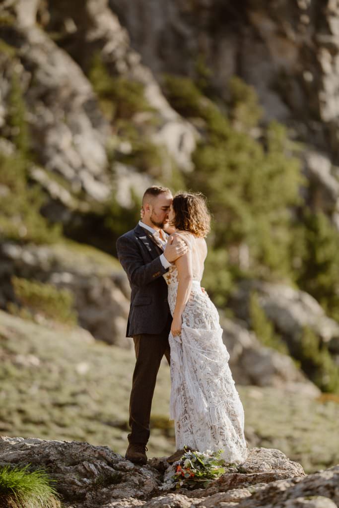 Colorado Adventure Elopement Hiking, The bride and a groom, adventurous souls are hiking at sunrise with headlamps to elope at alpine lake here in Colorado trails. Photos by Justyna E Butler Photography, Colorado Adventure Elopement photographer, a light chaser for boho brides who love adventures
