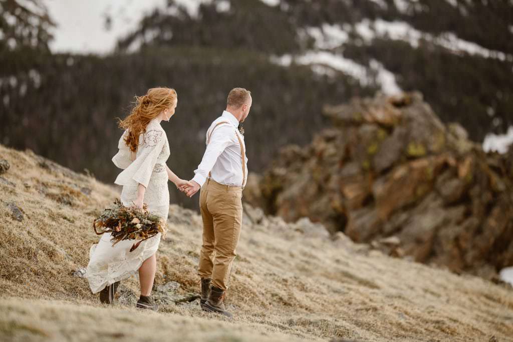 Scenic portrait with snow-capped peaks and alpine tundra in Colorado.