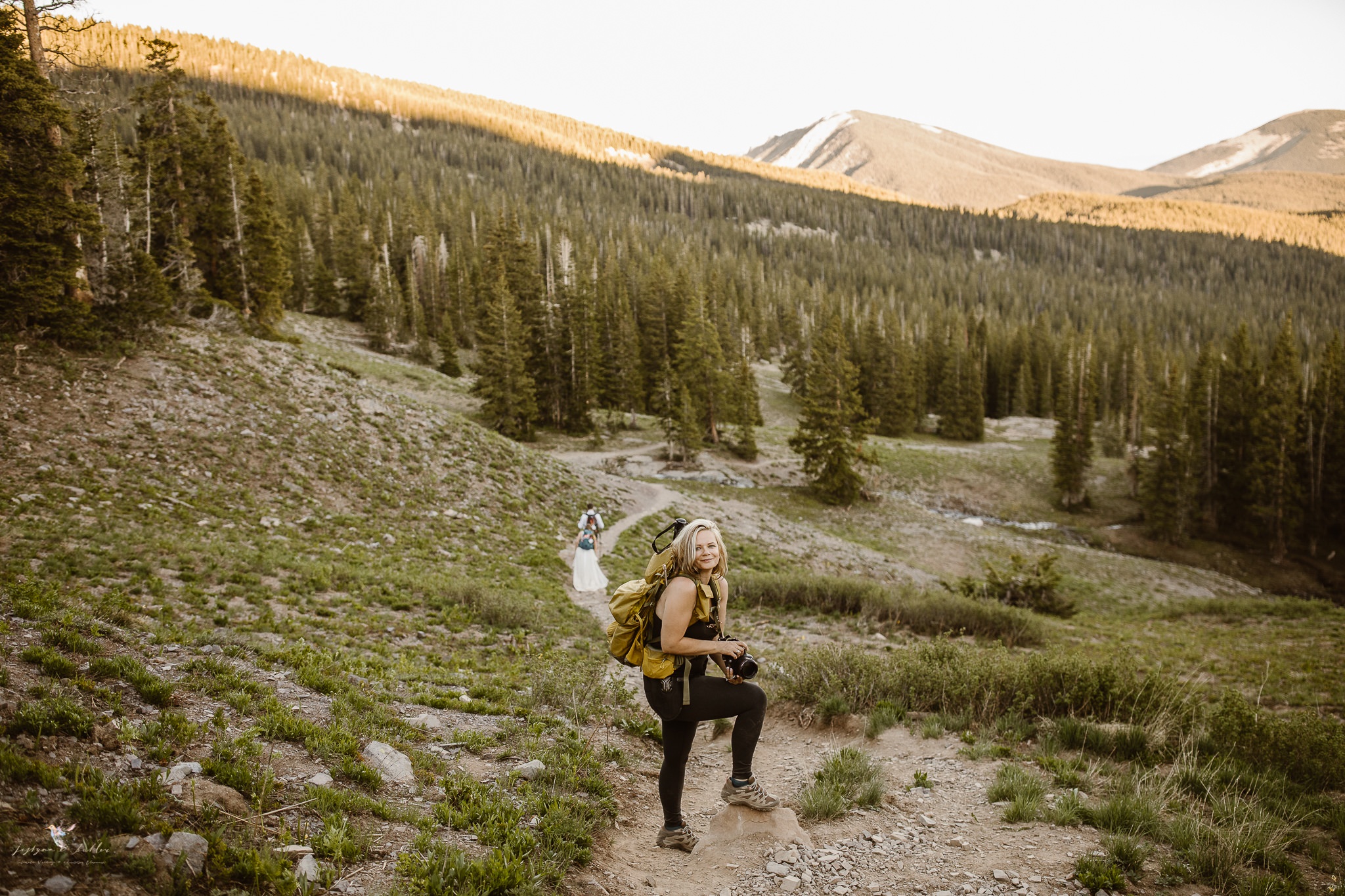 Justyna E Butler is an award-winning Colorado-based elopement and intimate wedding photographer. Known for her 