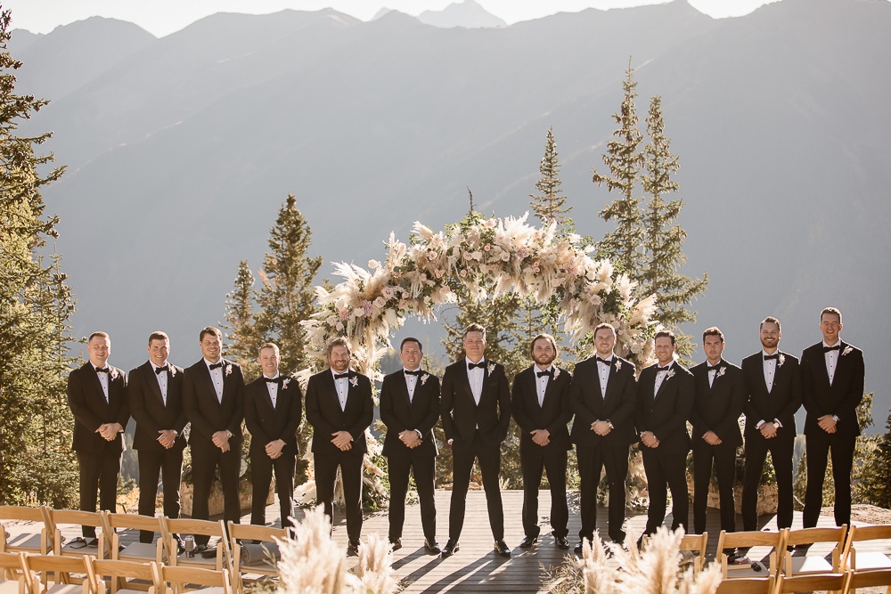 Newlyweds photographed against the Elk Mountains during their Aspen wedding