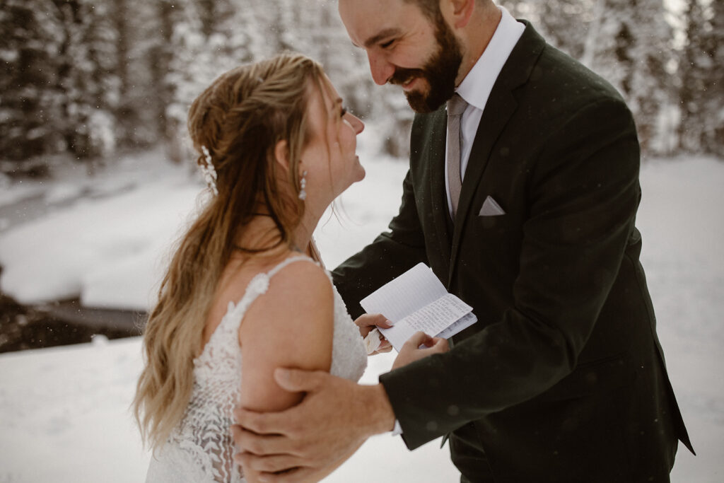 Newlyweds celebrating above the clouds in Rocky Mountain National Park