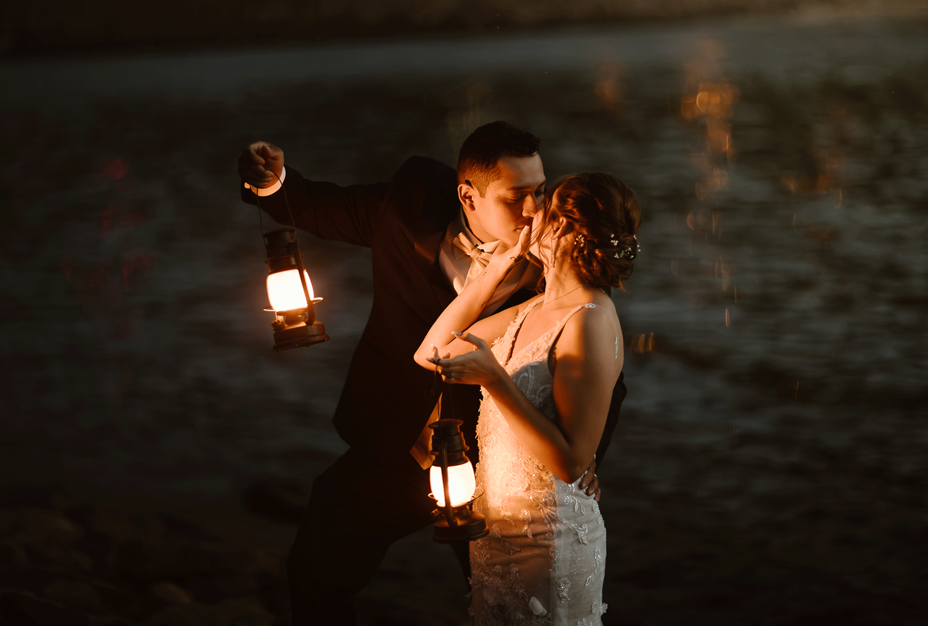 Emotional close-up of a Colorado adventure elopement where the groom kisses his bride’s tattooed hand and she embraces him with a kiss, captured by an intimate wedding photographer

Twilight Vows in Estes Park Colorado Colorado Elopement Photographer