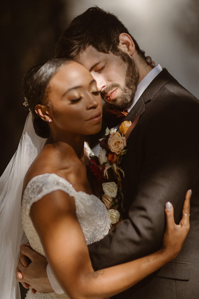 This Woodlands Fairytale At Copper Waterfalls captured by Justyna E Butler, best Colorado Wedding Photographers