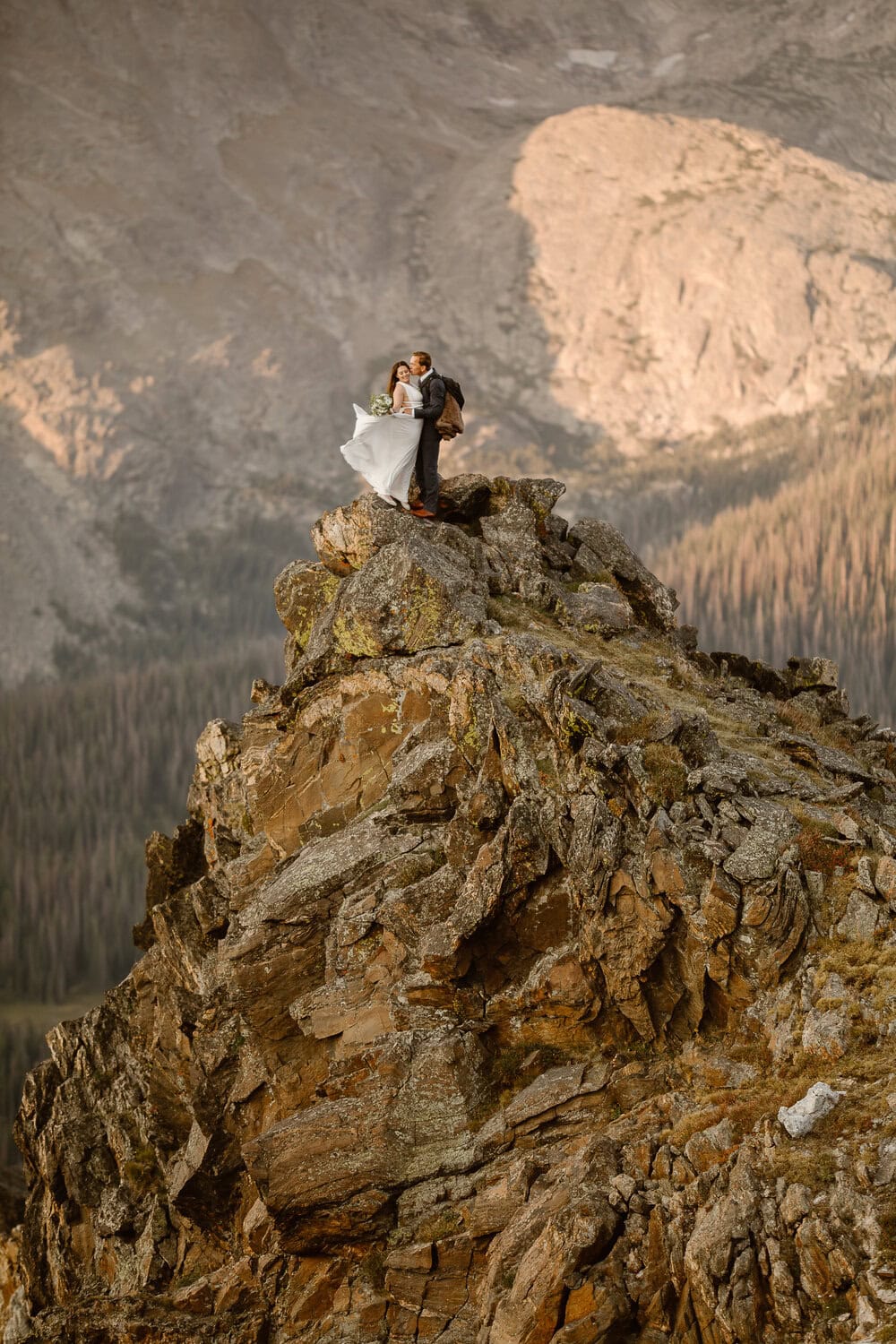 Justyna E Butler — Colorado Elopement Photographer specializing in cinematic, hiking, and adventure elopements in the Rocky Mountains