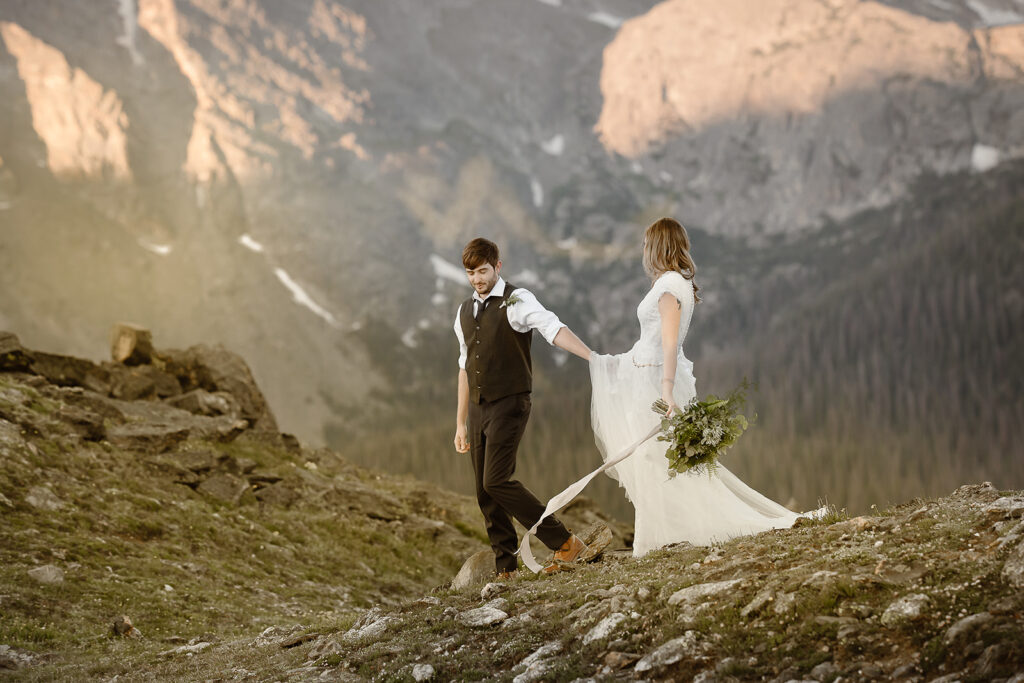 Justyna E. Butler, Colorado Elopement Photographer specializing in cinematic adventure elopements, hiking elopements, intimate weddings in the Rocky Mountains of Colorado & Worldwide