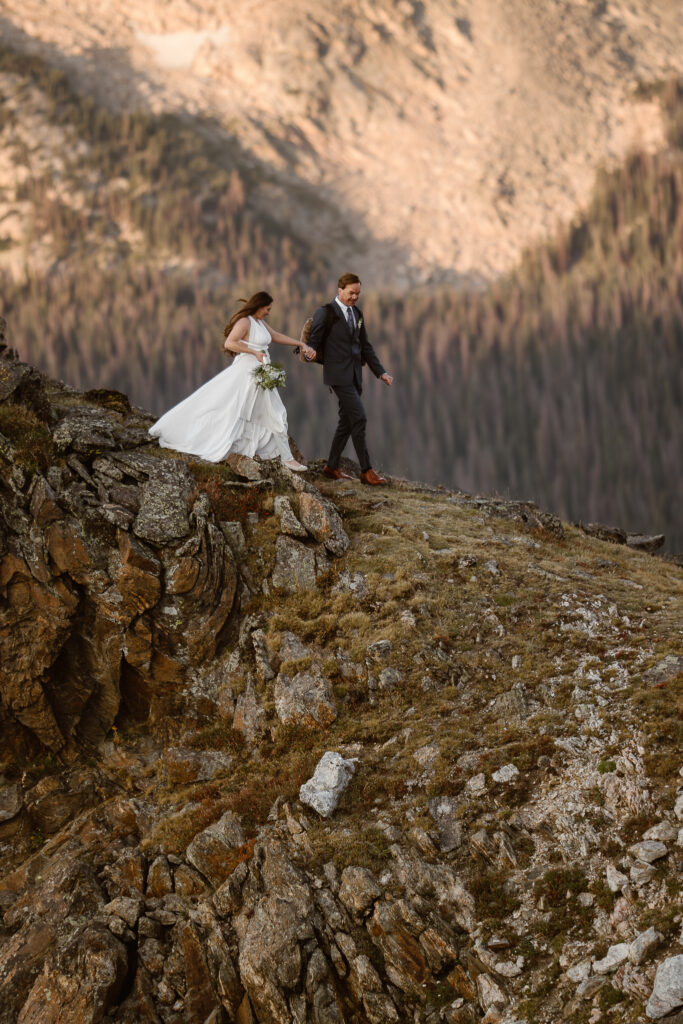 Justyna E. Butler, Colorado Elopement Photographer specializing in cinematic adventure elopements, hiking elopements, intimate weddings in the Rocky Mountains of Colorado & Worldwide