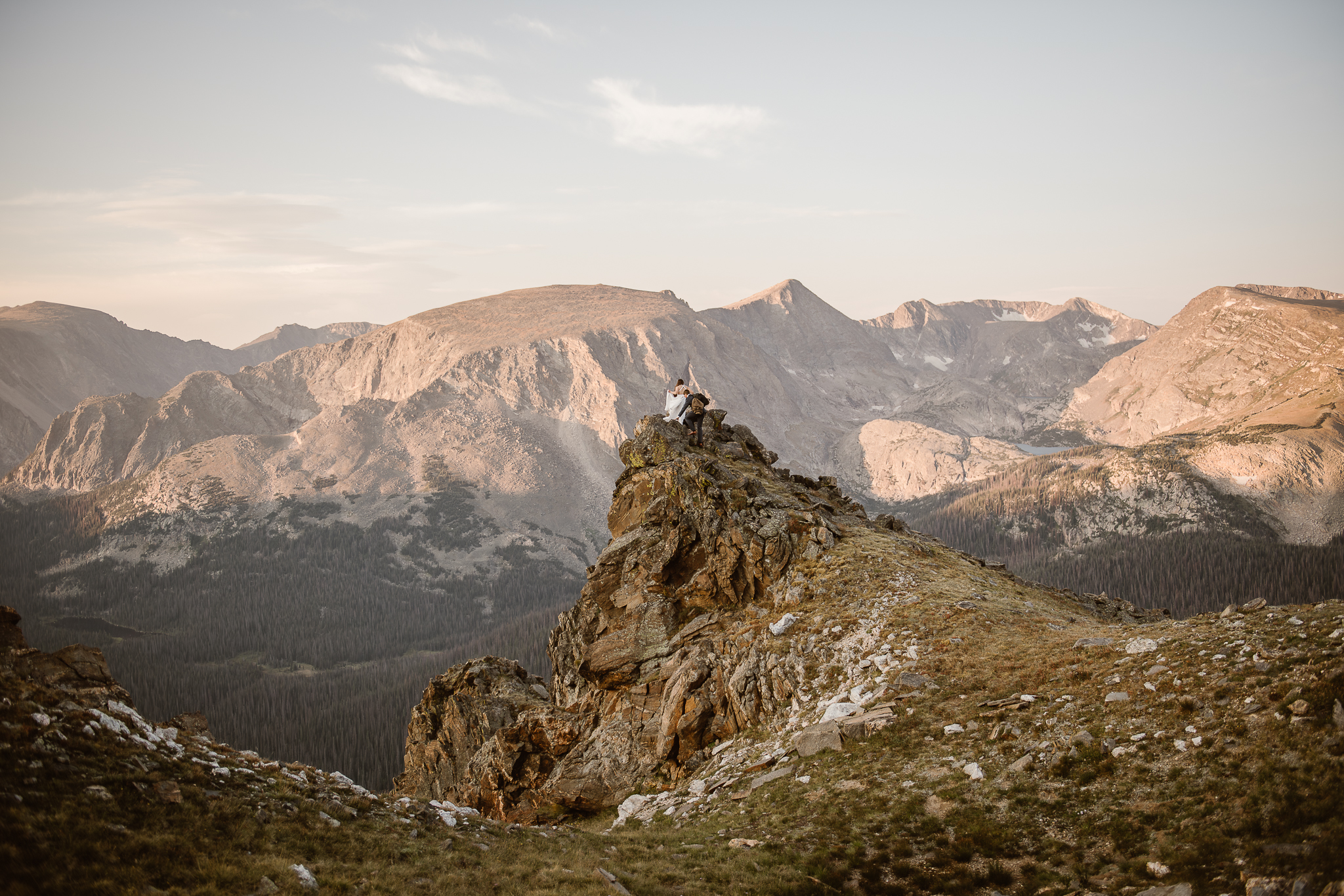 Justyna E. Butler, Colorado Elopement Photographer specializing in cinematic adventure elopements, hiking elopements, intimate weddings in the Rocky Mountains of Colorado & Worldwide