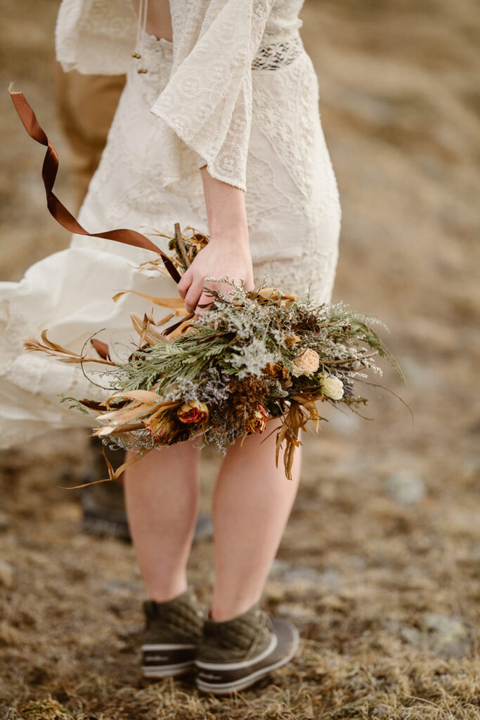 Justyna E. Butler, Colorado Elopement Photographer specializing in cinematic adventure elopements, hiking elopements, intimate weddings in the Rocky Mountains of Colorado & Worldwide