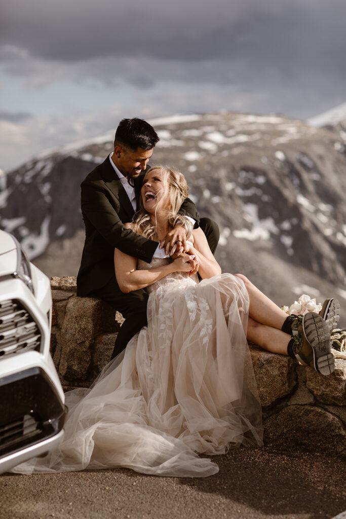 Colorado elopement photographer capturing couple in Rocky Mountains at sunset