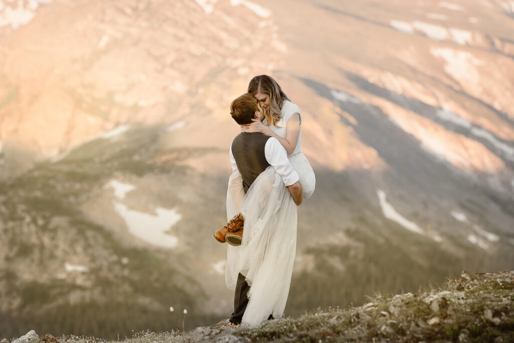 Justyna E. Butler, Colorado Elopement Photographer specializing in cinematic adventure elopements, hiking elopements, intimate weddings in the Rocky Mountains of Colorado & Worldwide