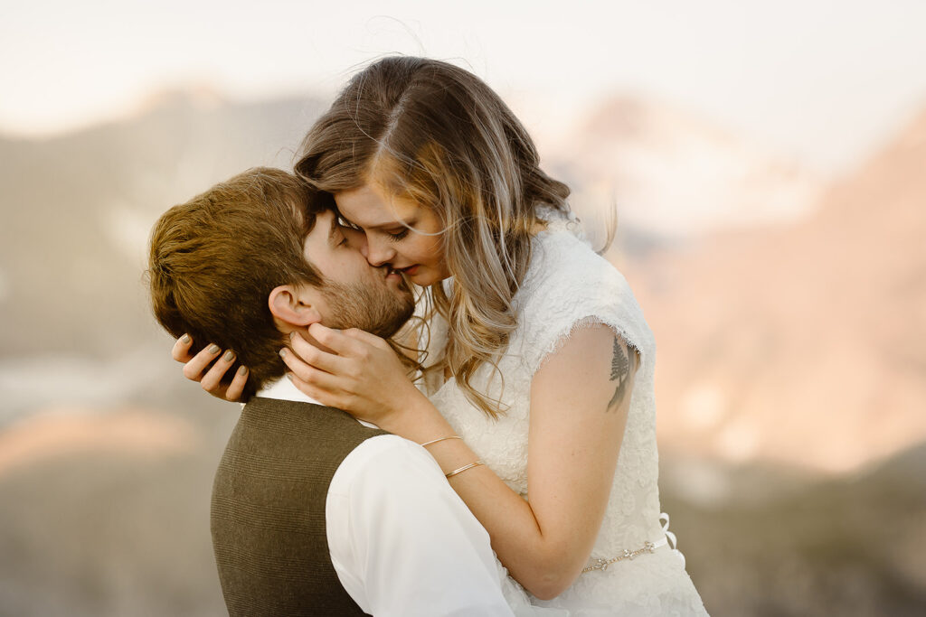 Justyna E. Butler, Colorado Elopement Photographer specializing in cinematic adventure elopements, hiking elopements, intimate weddings in the Rocky Mountains of Colorado & Worldwide