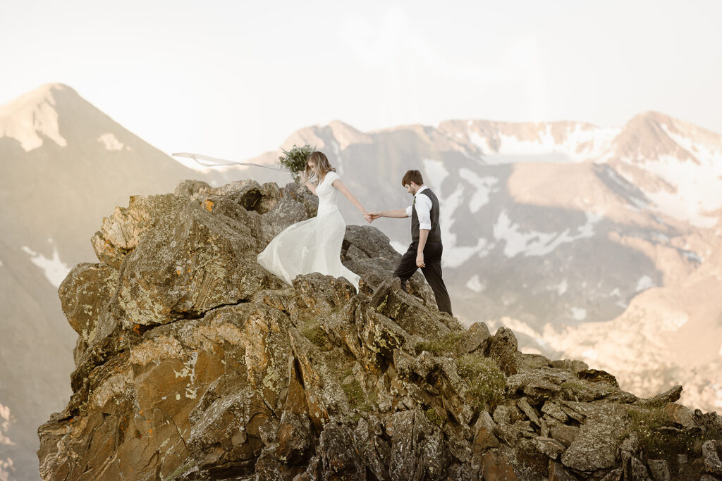 Justyna E. Butler, Colorado Elopement Photographer specializing in cinematic adventure elopements, hiking elopements, intimate weddings in the Rocky Mountains of Colorado & Worldwide