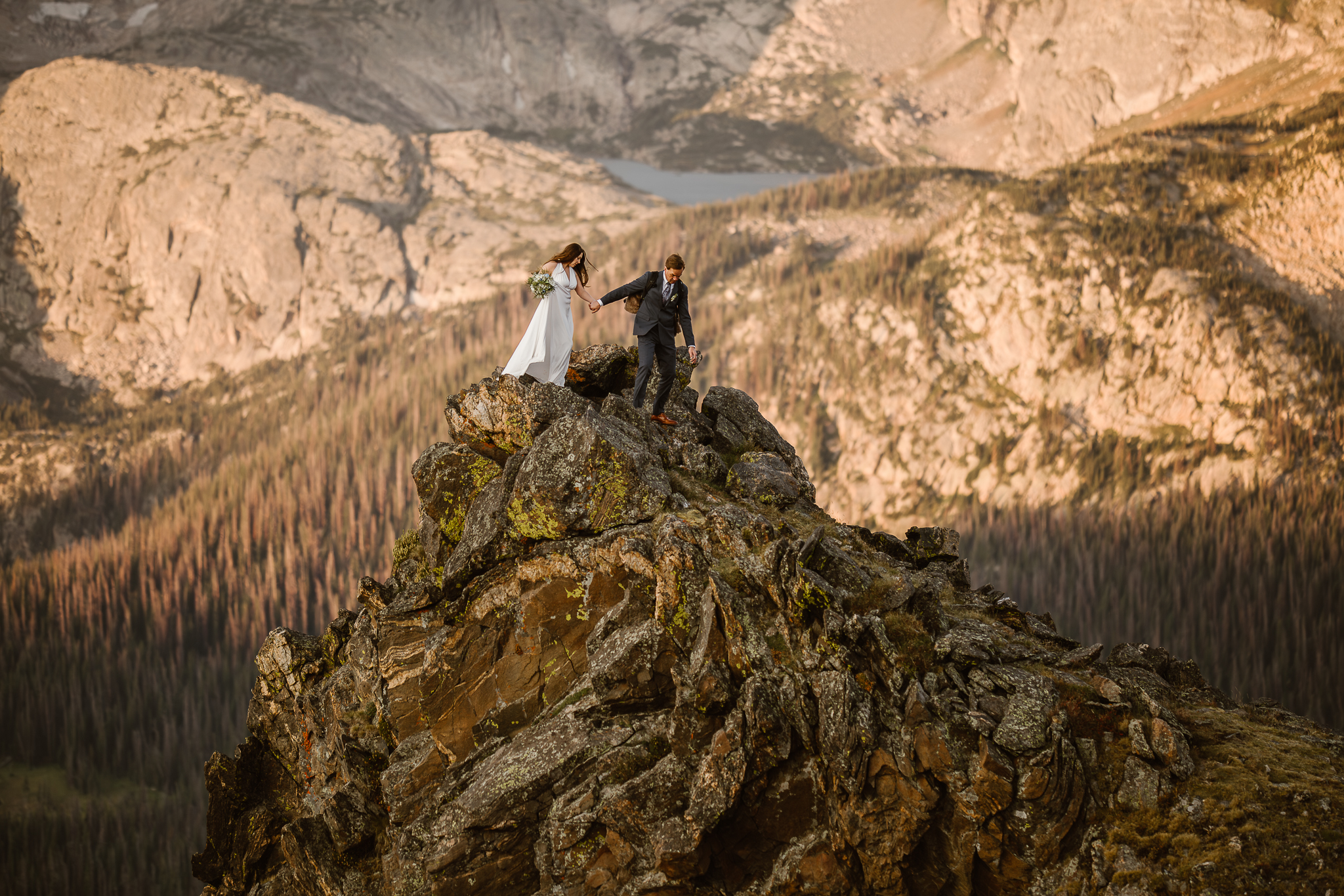 ustyna E. Butler | Colorado Elopement Photographer SPECIALIZING IN CINEMATIC ADVENTURE ELOPEMENTS, HIKING ELOPEMENTS & INTIMATE MOUNTAIN WEDDINGS IN THE ROCKY MOUNTAINS & WORLDWIDE TEL:+17202190912