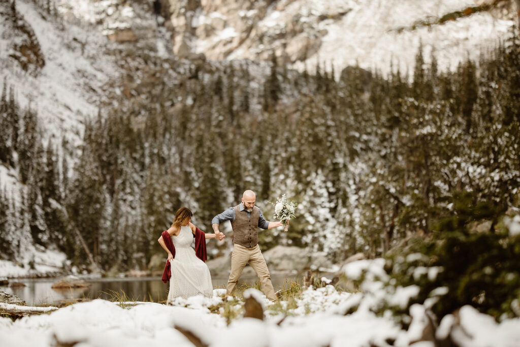 An adventurous Colorado elopement surrounded by breathtaking mountain scenery, capturing the couple's connection, genuine emotions, and the beauty of their wedding day in the Rocky Mountains.