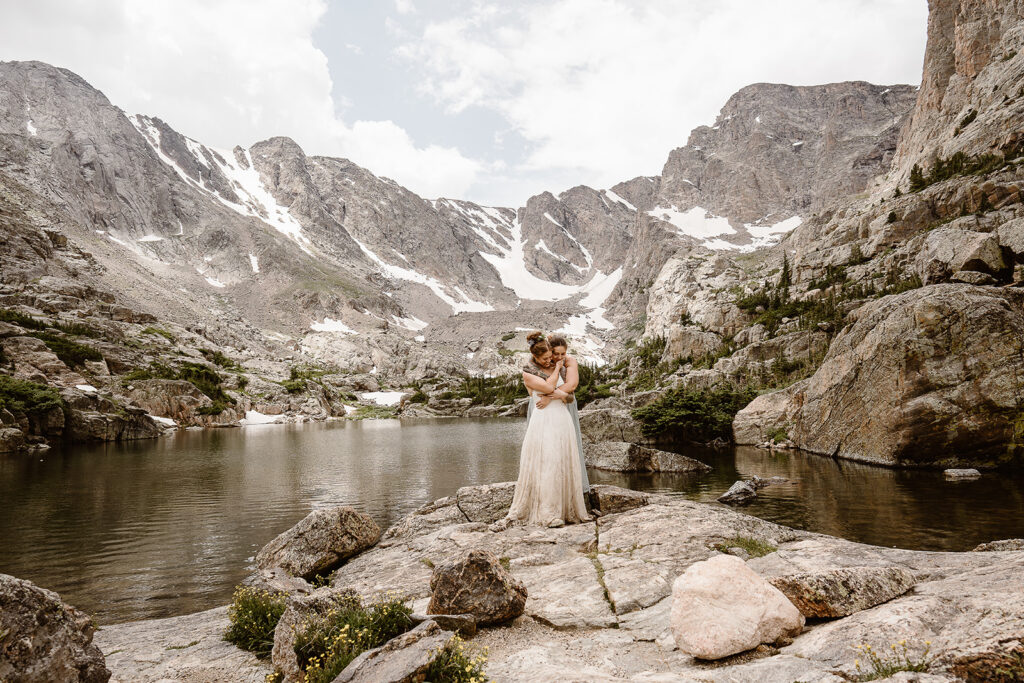 Colorado elopement couple watching sunset over Rocky Mountains