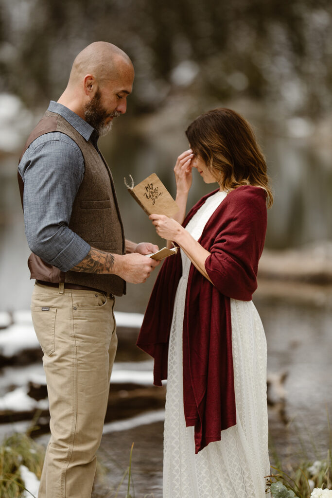 Couple exchanging vows during a Colorado mountain elopement