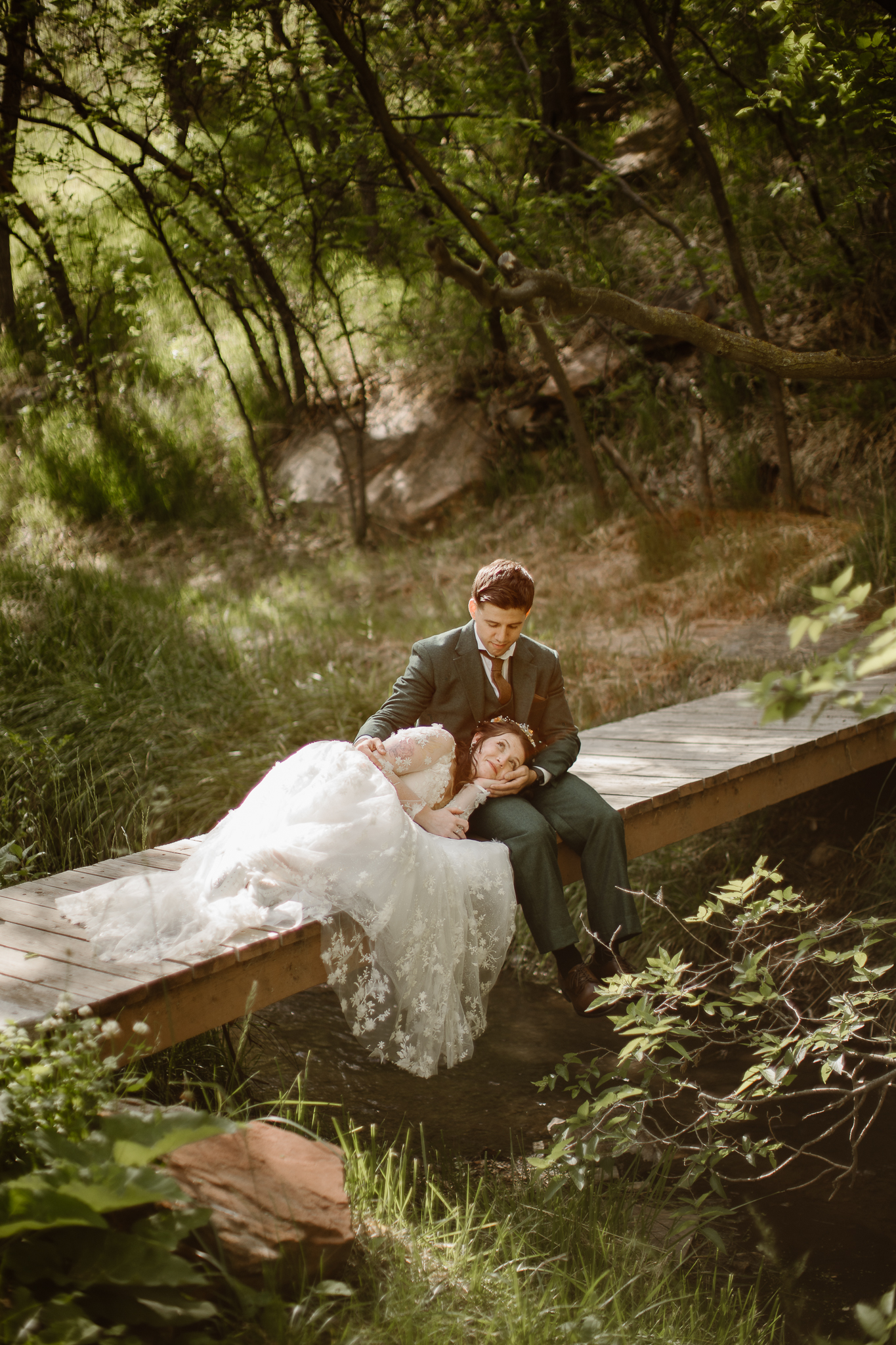 Bride and groom enjoying a quiet moment together during their Colorado hiking elopement.
