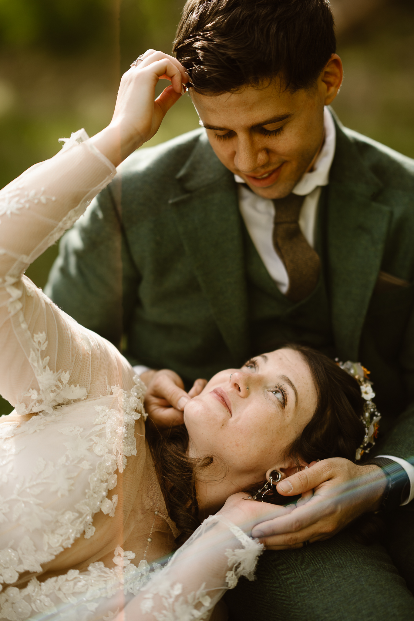 Romantic close-up of a couple exchanging loving glances in the Colorado Rocky Mountains.