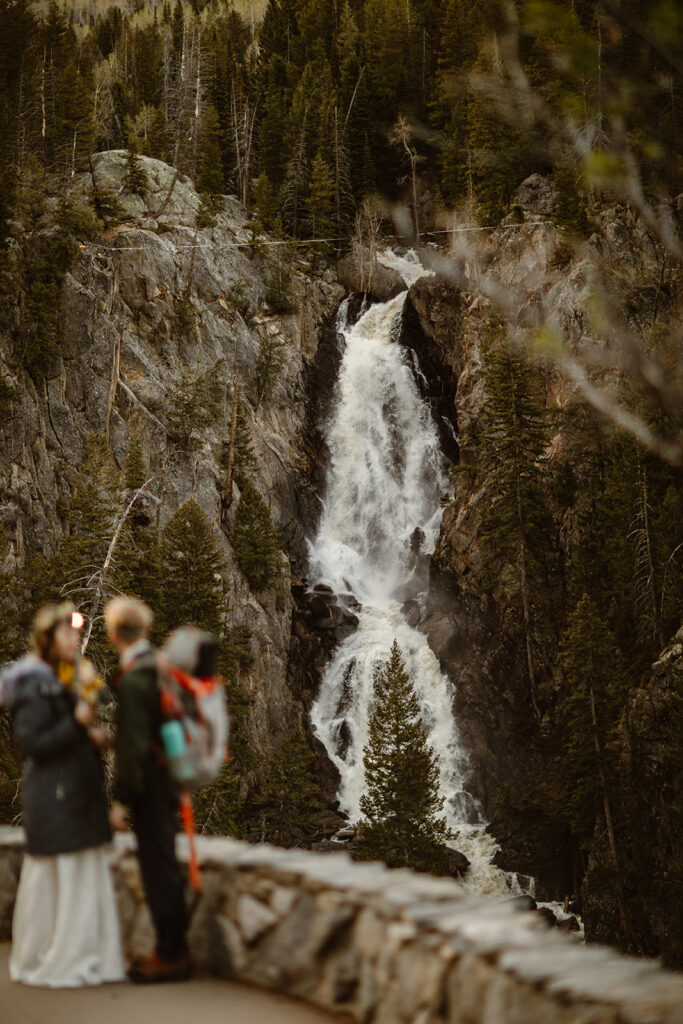 Steamboat Springs waterfall elopement photographer capturing an adventurous couple