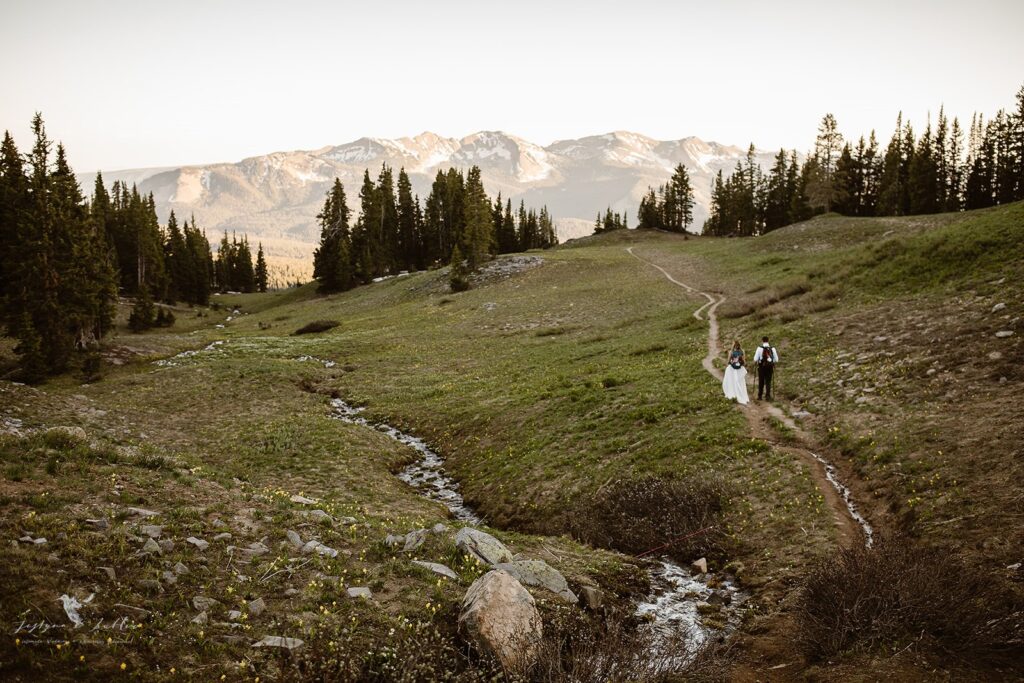 Seasonal waterfall flowing down a rocky mountainside during spring snowmelt