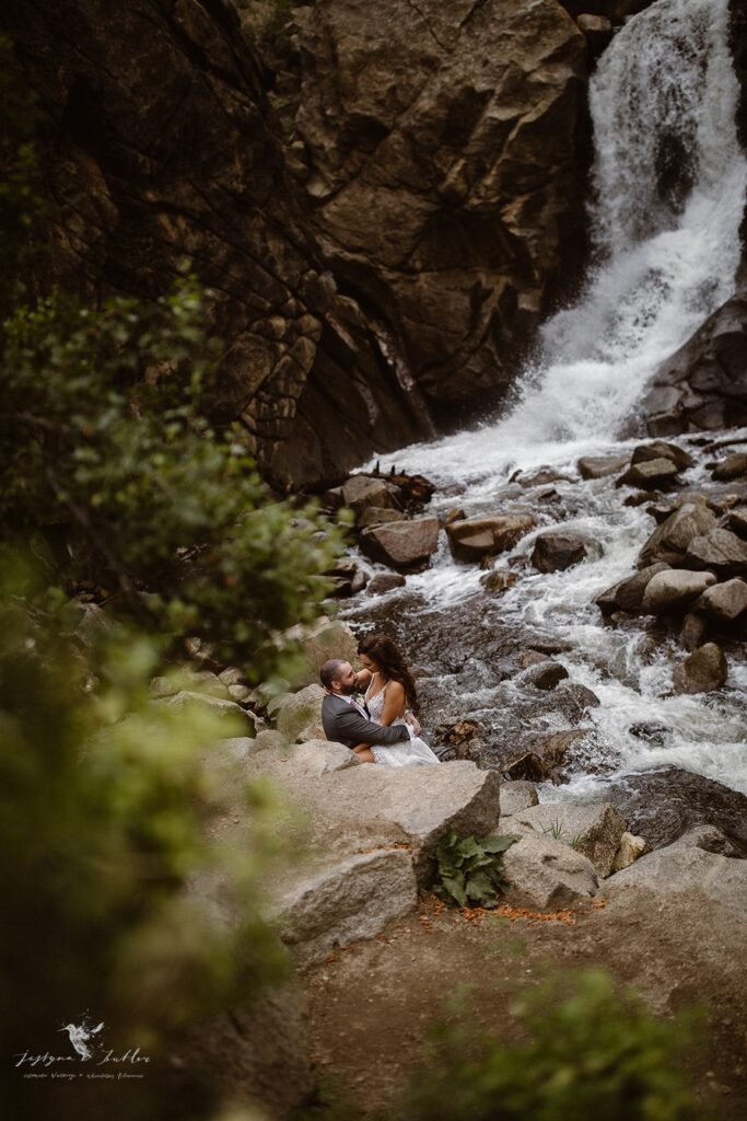 Romantic elopement portraits at Boulder Falls near Boulder, Colorado