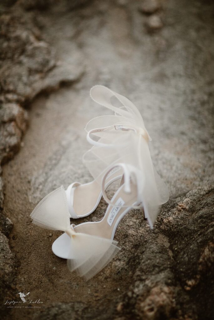 Details of the Jimmy Choo bridal shoes by Small waterfall tumbling over rocks in a Colorado alpine landscape